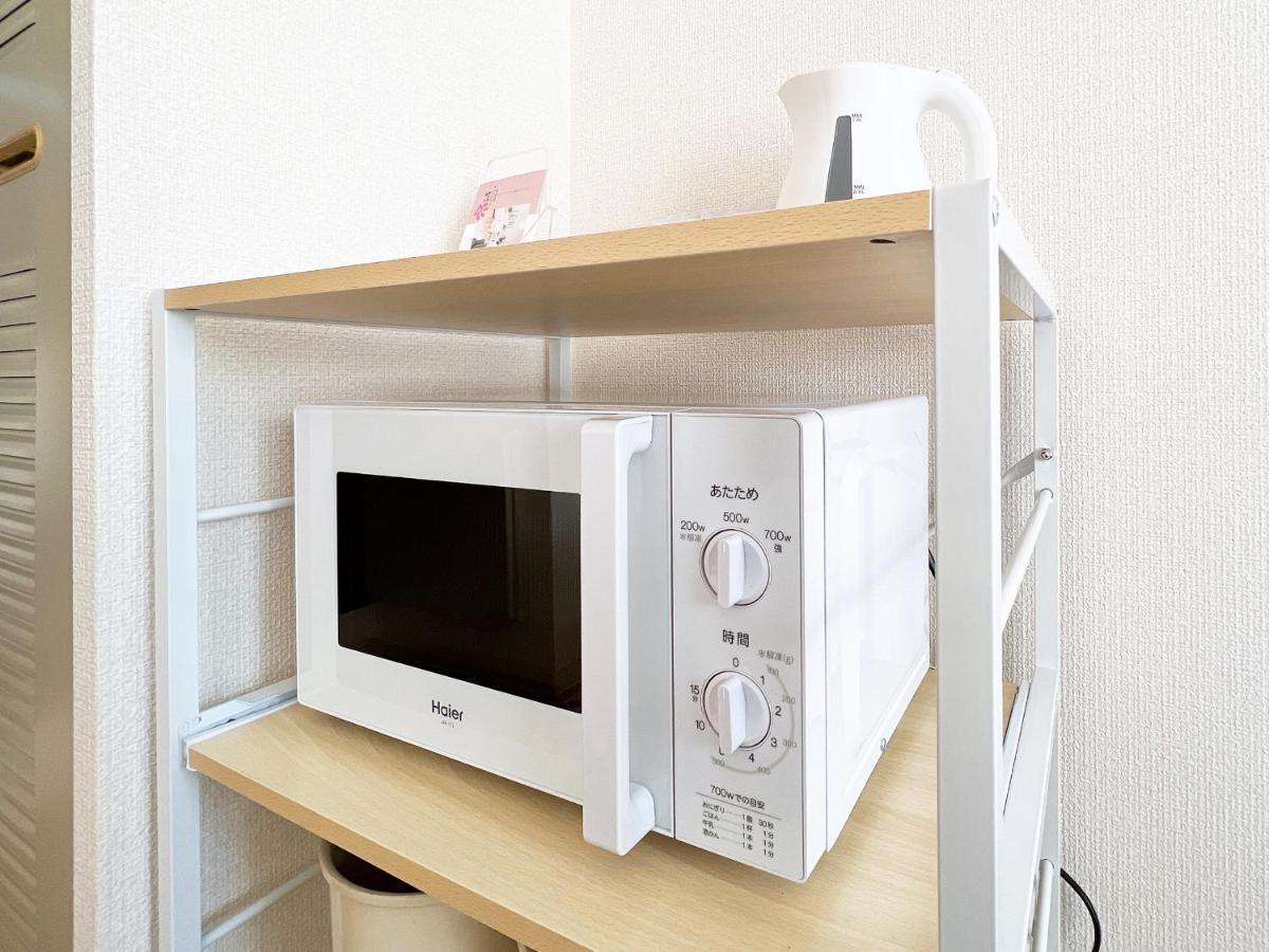 Ouchi Hotel Nishi-Tokaichi Хіросіма Екстер'єр фото